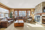 This stunning living room boasts a cozy fireplace, perfect for chilly evenings.