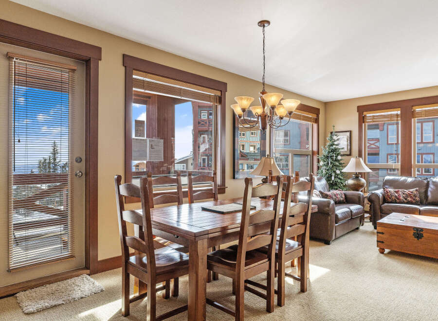 This stunning property boasts a cozy dining area, perfect for intimate gatherings.
