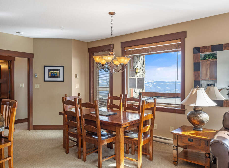 This stunning dining area offers a warm and inviting space for gatherings.