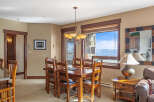 This stunning dining area offers a warm and inviting space for gatherings.