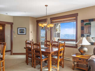 This stunning dining area offers a warm and inviting space for gatherings.