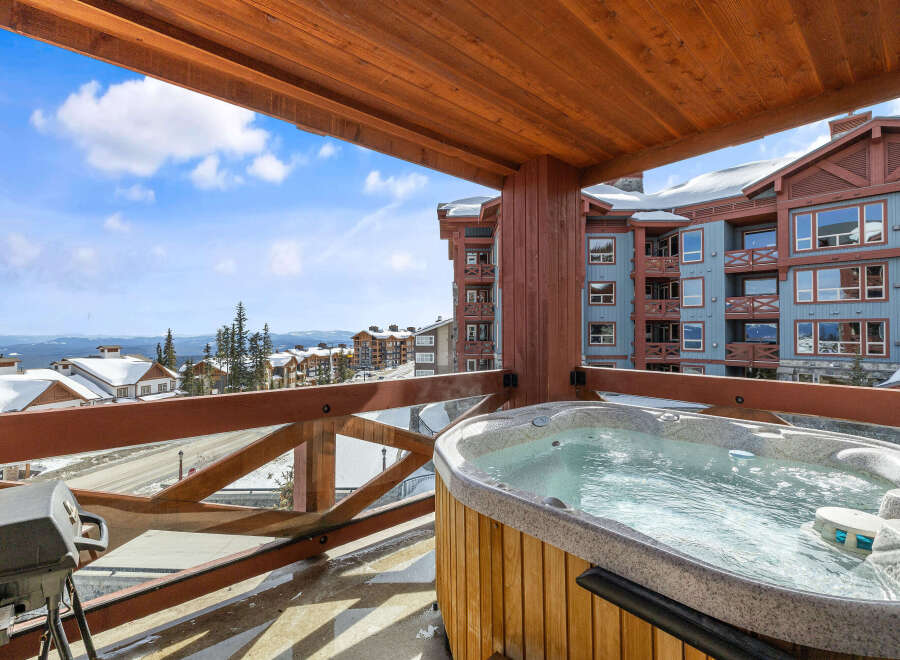 Enjoy breathtaking mountain views from this luxurious hot tub.