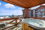 Enjoy breathtaking mountain views from this luxurious hot tub.