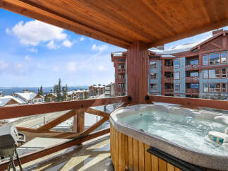 Enjoy breathtaking mountain views from this luxurious hot tub.