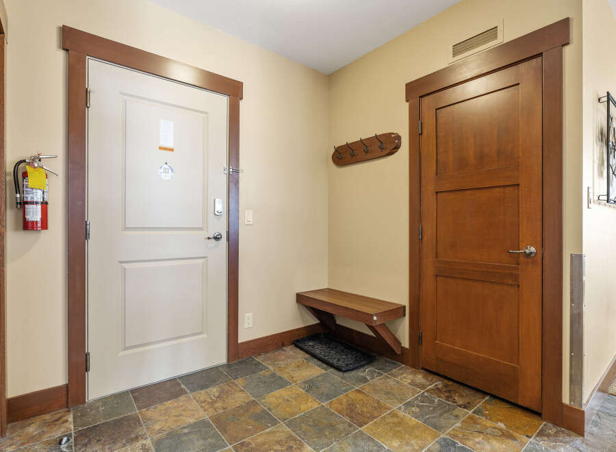 Step into this inviting entryway, showcasing a blend of functionality and style.