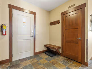 Step into this inviting entryway, showcasing a blend of functionality and style.