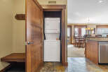 Step into this beautifully designed property and discover a convenient laundry area with a stacked washer and dryer.