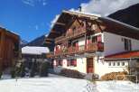 Discover the charm of this stunning chalet nestled in a picturesque mountain setting.