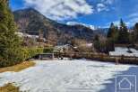 Discover a stunning property nestled in a picturesque mountain setting.