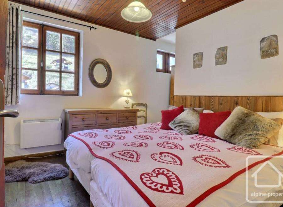 Discover the charm of this cozy bedroom, perfect for a relaxing getaway.