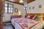 Discover the charm of this cozy bedroom, perfect for a relaxing getaway.