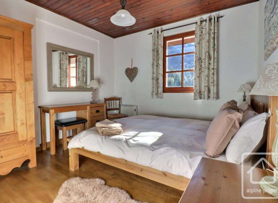 Discover the charm of this cozy bedroom, perfect for a relaxing retreat.