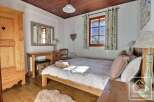 Discover the charm of this cozy bedroom, perfect for a relaxing retreat.