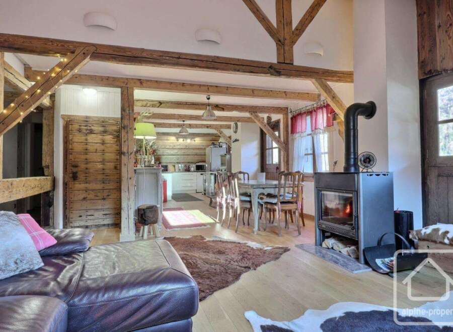 Experience rustic charm in this stunning property! Featuring exposed wooden beams, a cozy fireplace, and a spacious layout, this home offers a warm and inviting atmosphere.