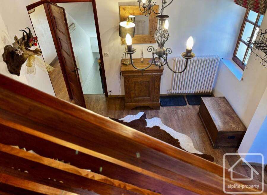 Discover the charm of this property, featuring a rustic interior with wooden accents and a cozy atmosphere.