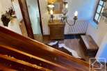 Discover the charm of this property, featuring a rustic interior with wooden accents and a cozy atmosphere.
