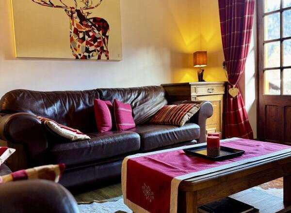 Experience the charm of this cozy living space, perfect for relaxation and entertaining.