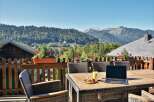 Enjoy breathtaking mountain views from this charming property.