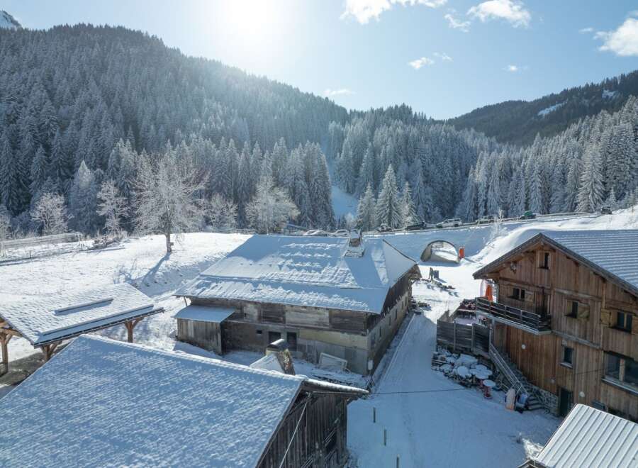 Nestled in a picturesque winter wonderland, this charming property offers a unique blend of rustic charm and modern comfort.