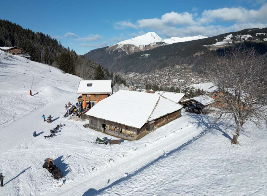 Nestled in a picturesque winter wonderland, this charming property offers a unique blend of rustic charm and modern convenience.