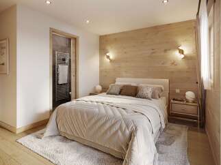 Step into a serene bedroom retreat, featuring a cozy bed with plush bedding and a stylish wooden accent wall.