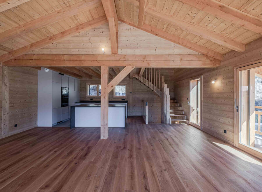 Step into this stunning wooden cabin, a perfect blend of rustic charm and modern design.