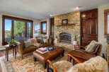 This stunning living room boasts a cozy fireplace, perfect for chilly evenings.