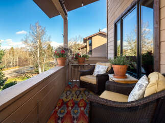 Enjoy breathtaking views from this charming balcony.