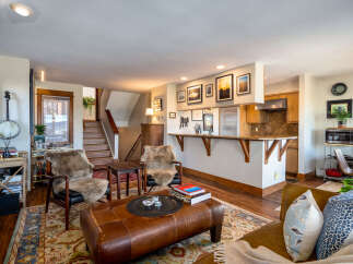 Step into this inviting living space, perfect for both relaxation and entertaining.
