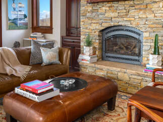 This stunning living room features a cozy fireplace, perfect for relaxing evenings.