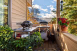 Enjoy outdoor living at its finest with this charming property! This space features a well-equipped outdoor kitchen, perfect for entertaining and culinary adventures.