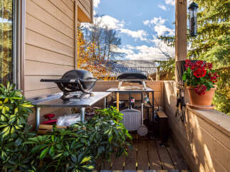 Enjoy outdoor living at its finest with this charming property! This space features a well-equipped outdoor kitchen, perfect for entertaining and culinary adventures.