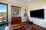 This stunning living room boasts a modern design with a touch of rustic charm.