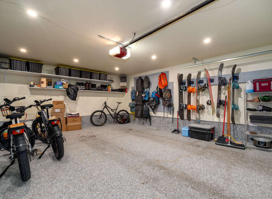 This spacious garage offers ample storage and organization solutions.