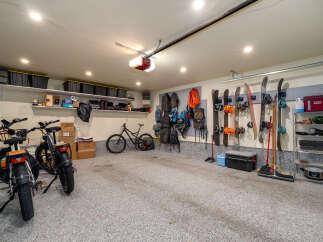 This spacious garage offers ample storage and organization solutions.
