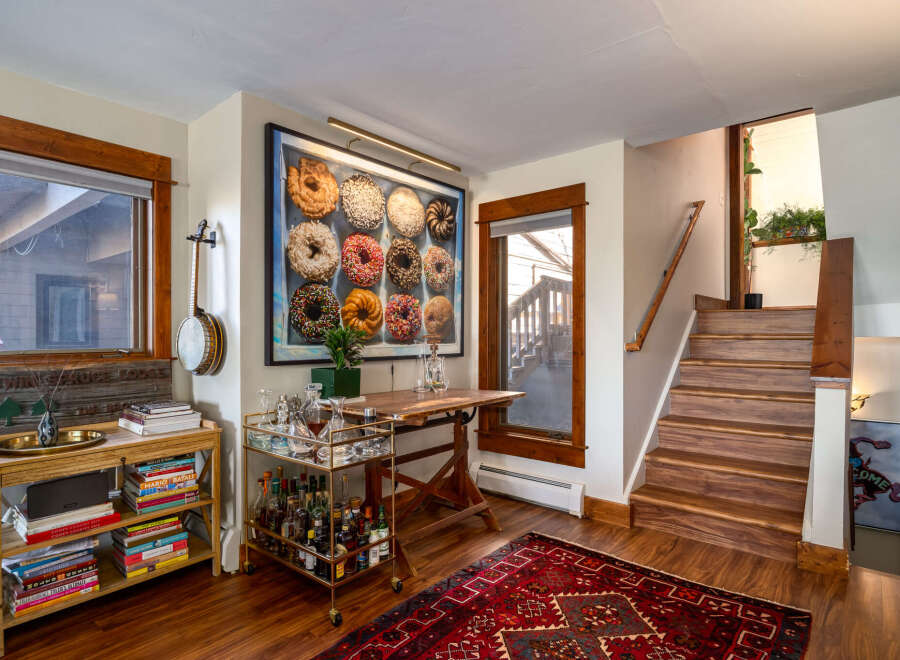 Step into this inviting home with a unique blend of rustic charm and modern comfort.