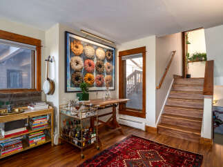 Step into this inviting home with a unique blend of rustic charm and modern comfort.