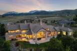 Experience luxury living in this stunning estate, boasting breathtaking mountain views and a meticulously designed exterior.