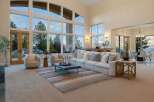 Experience luxury living in this stunning property, featuring expansive windows that flood the space with natural light.