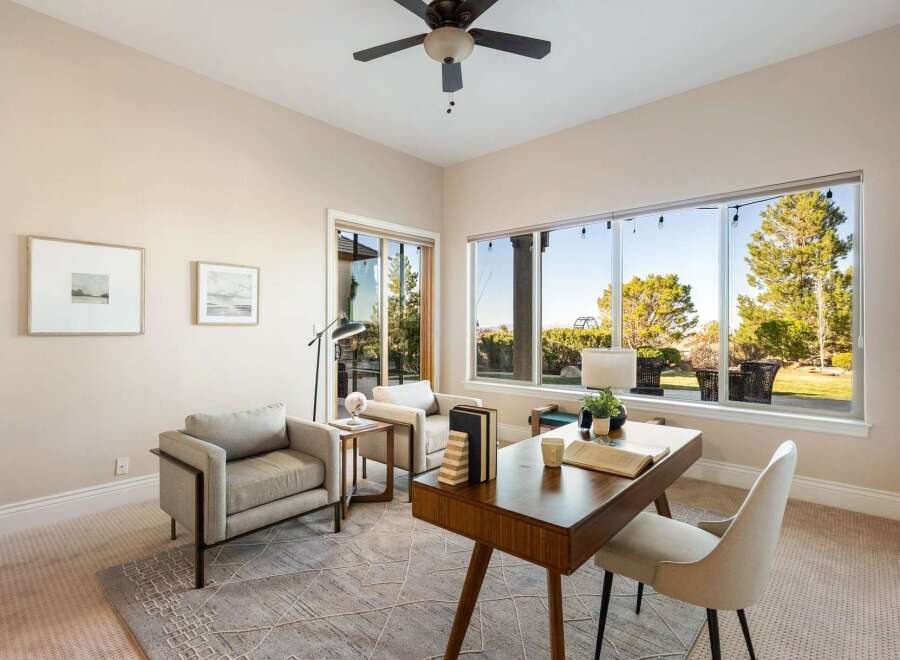 This stunning property boasts a bright and airy home office, perfect for remote work or creative endeavors.