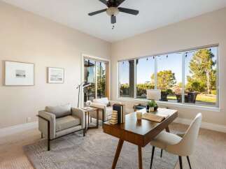 This stunning property boasts a bright and airy home office, perfect for remote work or creative endeavors.