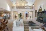 Step into luxury with this stunning home featuring a grand entrance and soaring ceilings.