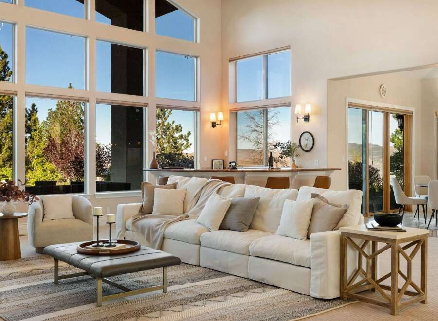 Experience luxury living in this stunning property, featuring expansive windows that flood the space with natural light and offer breathtaking views.