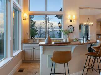 This stunning property boasts a beautifully designed bar area, perfect for entertaining guests.