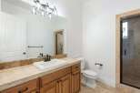 This stunning bathroom boasts a modern design with a touch of elegance.