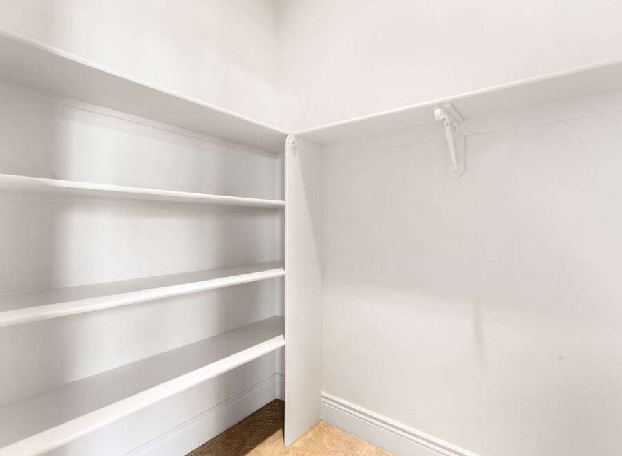 Discover the perfect blend of functionality and style with this property's thoughtfully designed storage solutions.