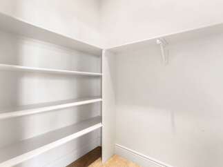 Discover the perfect blend of functionality and style with this property's thoughtfully designed storage solutions.