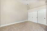 Discover the elegance of this spacious room, featuring a neutral color palette that creates a serene atmosphere.