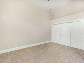 Discover the elegance of this spacious room, featuring a neutral color palette that creates a serene atmosphere.