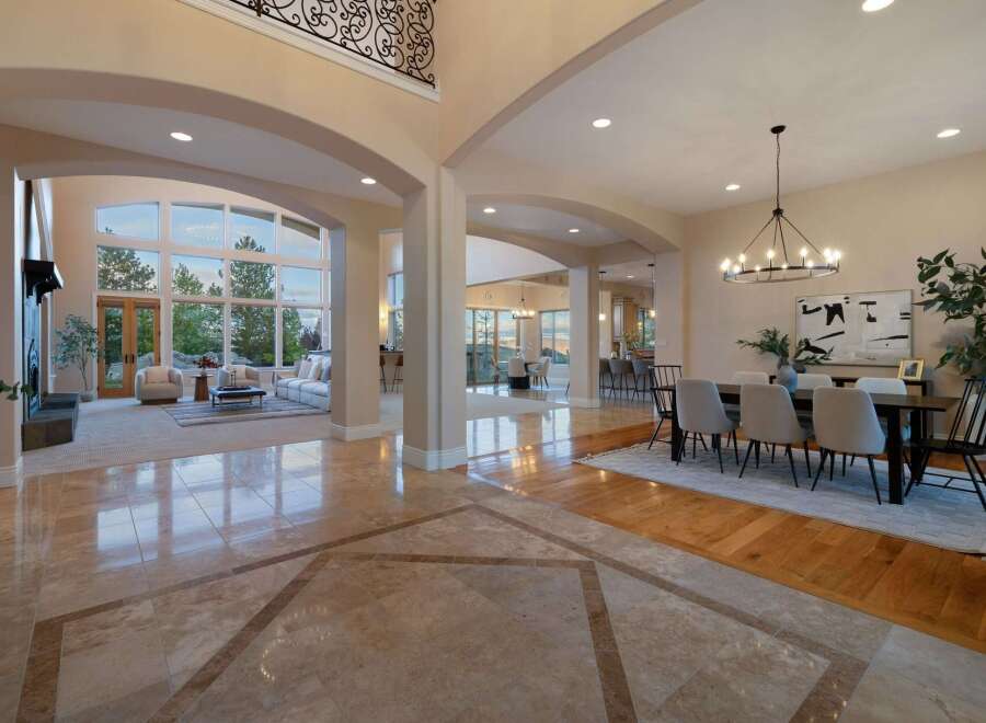 Step into luxury with this stunning property, showcasing an open-concept design and exquisite architectural details.